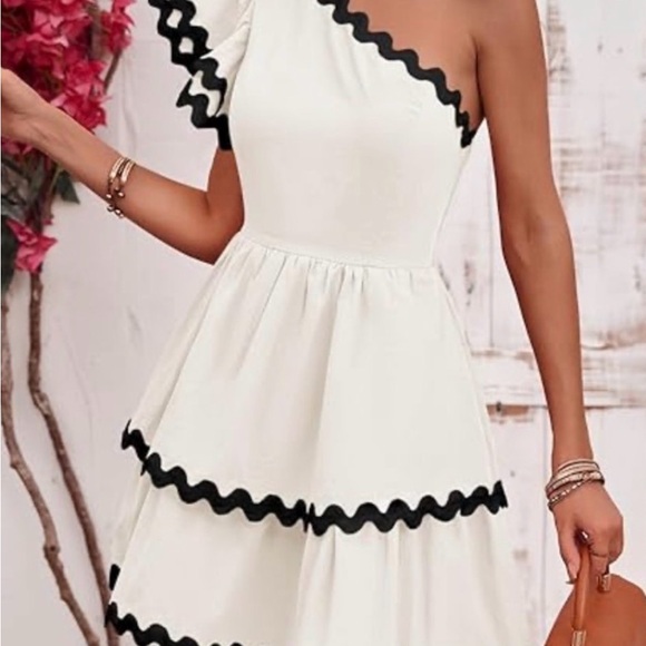 Zesica Dresses & Skirts - One-Shoulder White Dress with Black Trim